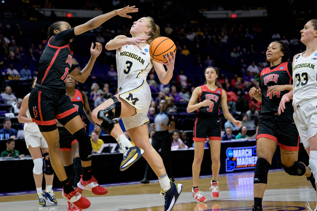 Michigan guard Maddie Nolan (3) shoots as UNLV guard Justice Ethridge (11) defends in the secon ...