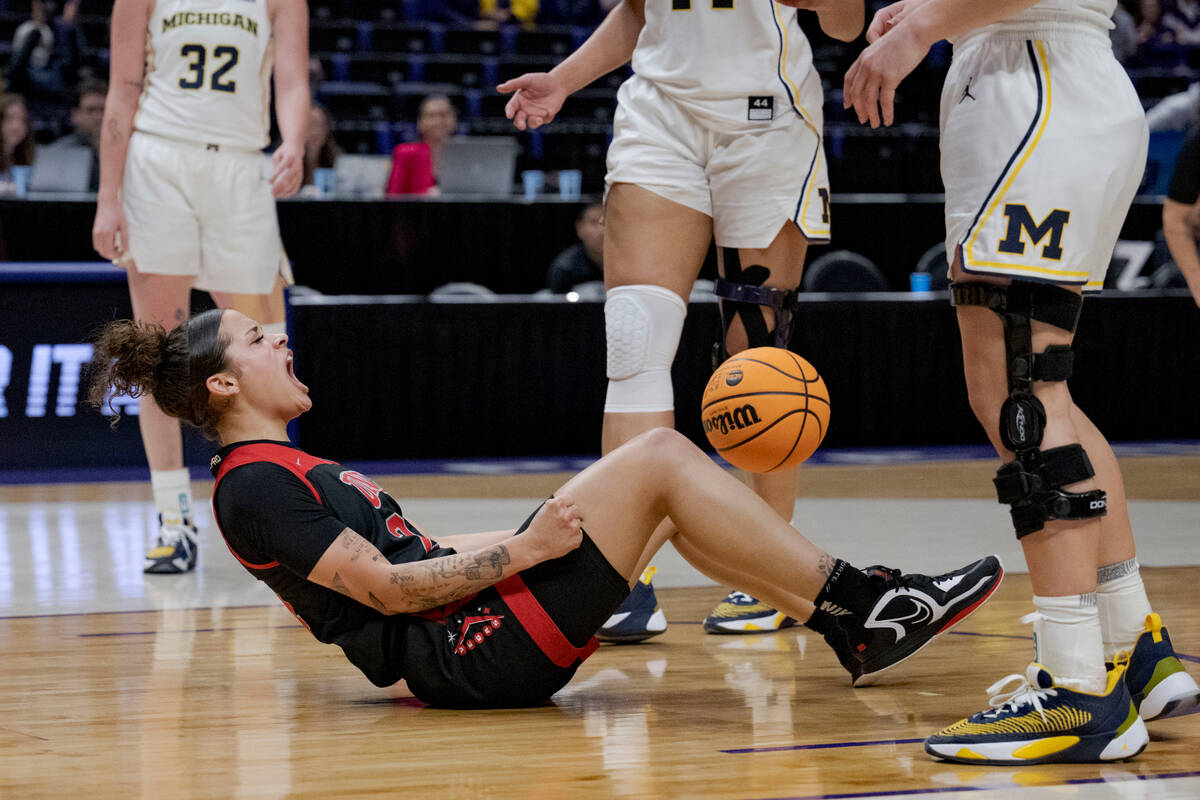 UNLV guard Essence Booker (24) celebrates a score and and a foul in the first half of a first-r ...