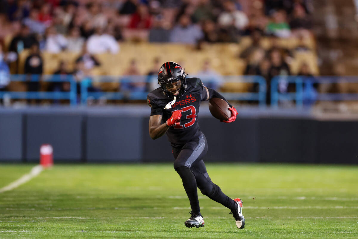 Vegas Vipers wide receiver Jeff Badet (13) runs out of bounds after a catch during the first ha ...