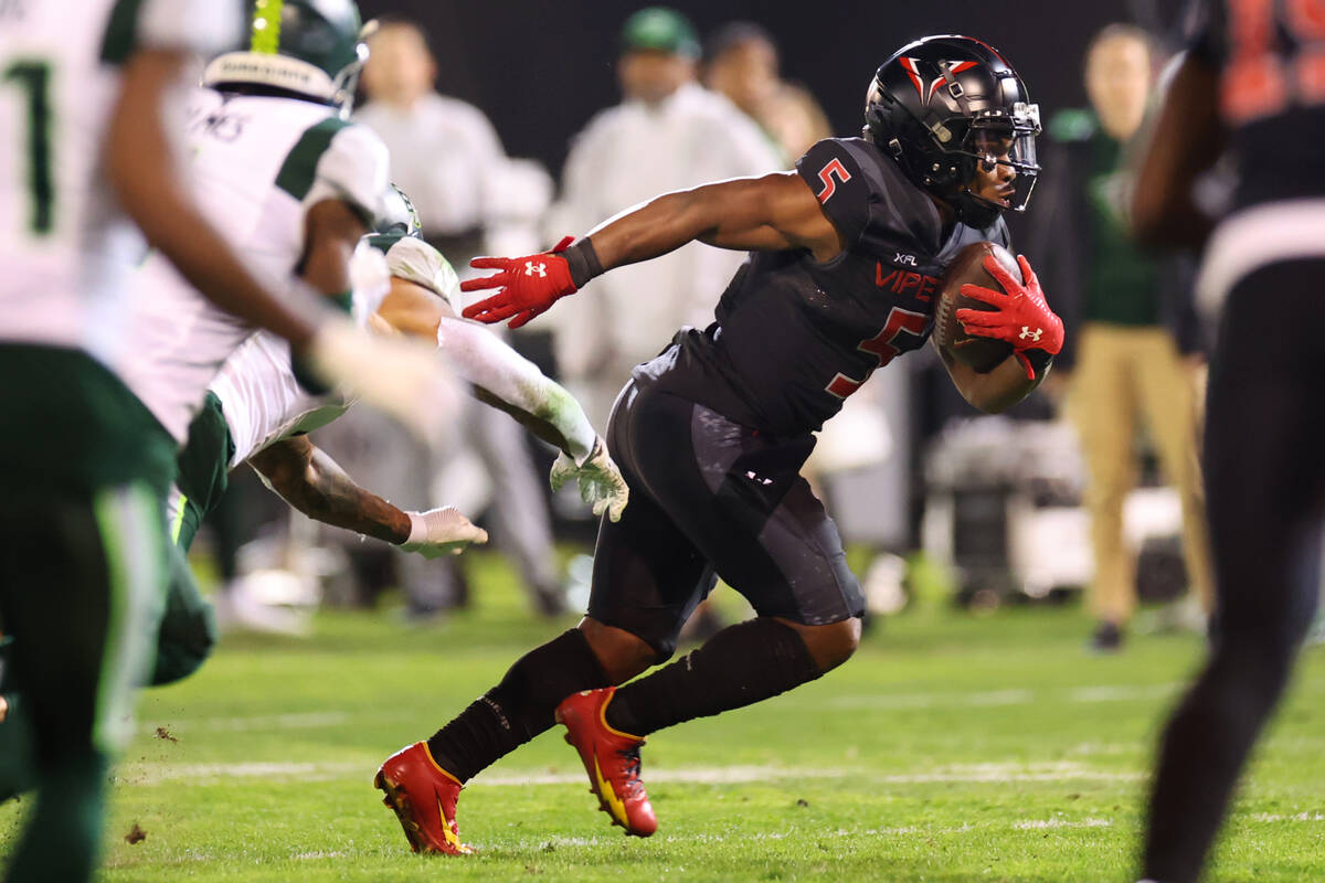 Vegas Vipers running back DeAndre Torrey (5) runs the ball against the Orlando Guardians during ...