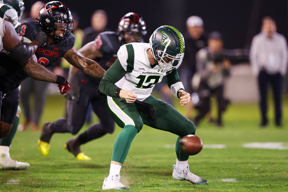 Vegas Vipers outside linebacker Pita Taumoepenu (0) forces a fumble against Orlando Guardians q ...