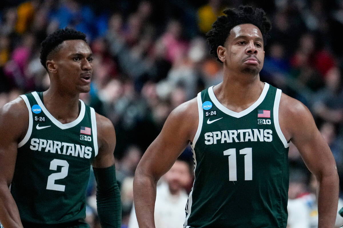 Michigan State guard A.J. Hoggard (11) celebrates after a three-point basket against Marquette ...