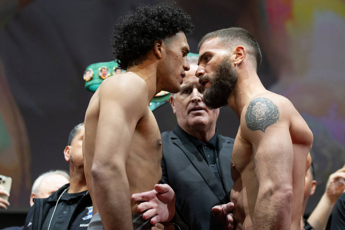 David Benavidez, left, and Caleb Plant, face off during a weigh-in event in advance of their su ...