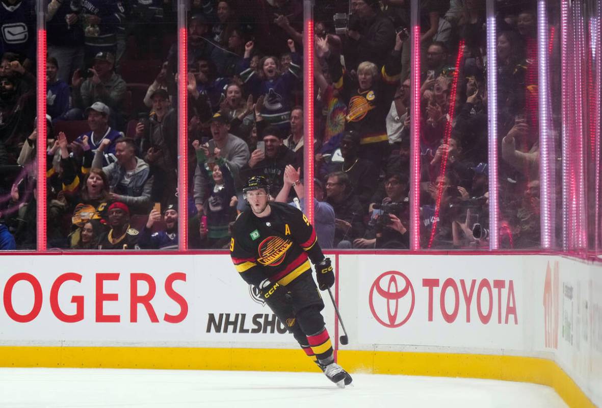 Vancouver Canucks' J.T. Miller celebrates his penalty-shot goal against the Vegas Golden Knight ...