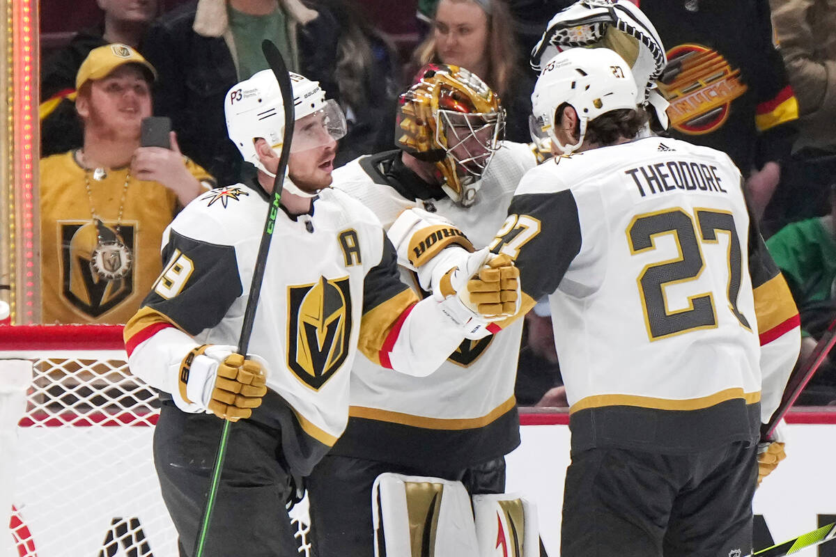 Vegas Golden Knights' Reilly Smith, Jonathan Quick and Shea Theodore, from left, celebrate the ...