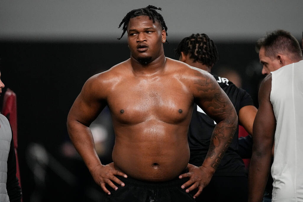 Former Georgia defensive lineman Jalen Carter stands after running football drills during Georg ...