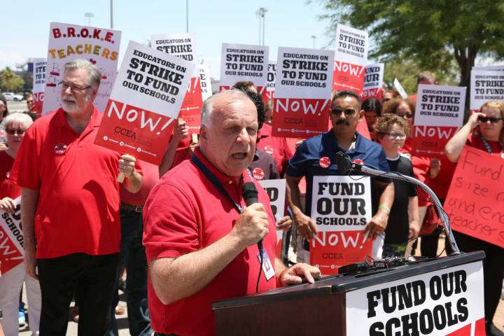 Centennial High School teacher Jim Frazee speaks during a rally with educators from the Clark C ...