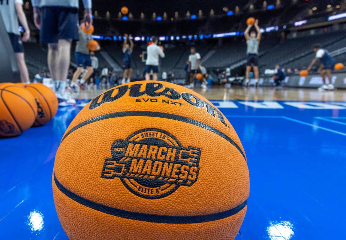 UConn players shoot around during the West Regional practice for the Sweet 16 games at the T-Mo ...