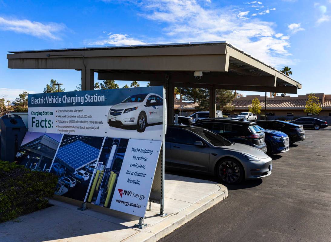 Electric vehicles get their battery recharged in the parking lot of NV Energy's headquarters at ...