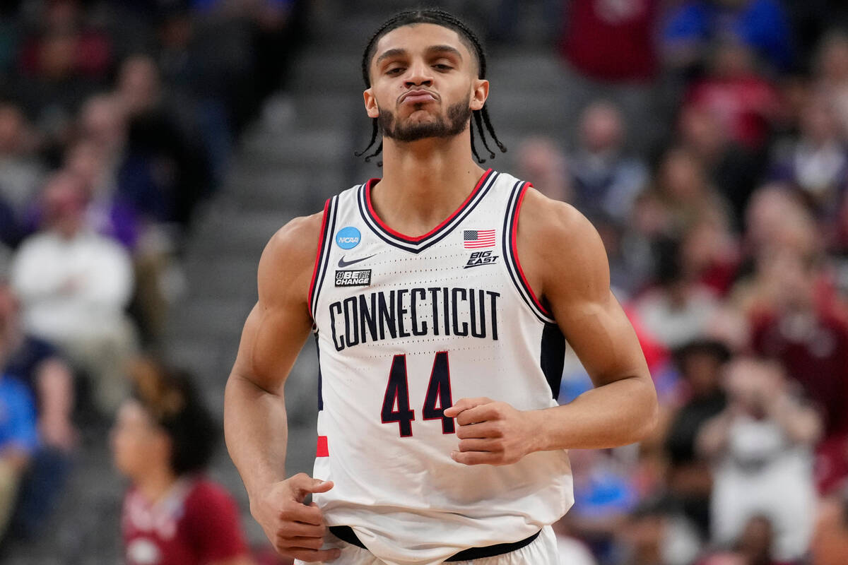 UConn's Andre Jackson Jr. (44) reacts in the first half of a Sweet 16 college basketball game a ...