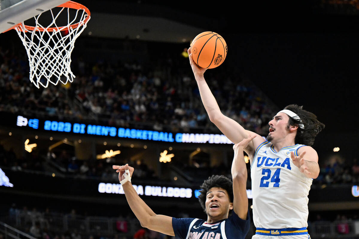 UCLA's Jaime Jaquez Jr. (24) shoots while defended by Gonzaga's Rasir Bolton (45) in the first ...