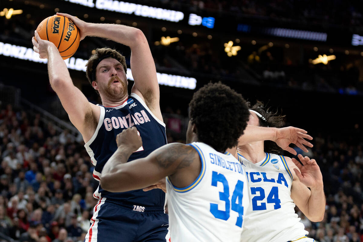 Gonzaga Bulldogs forward Drew Timme (2) shoots against UCLA Bruins guard David Singleton (34) a ...