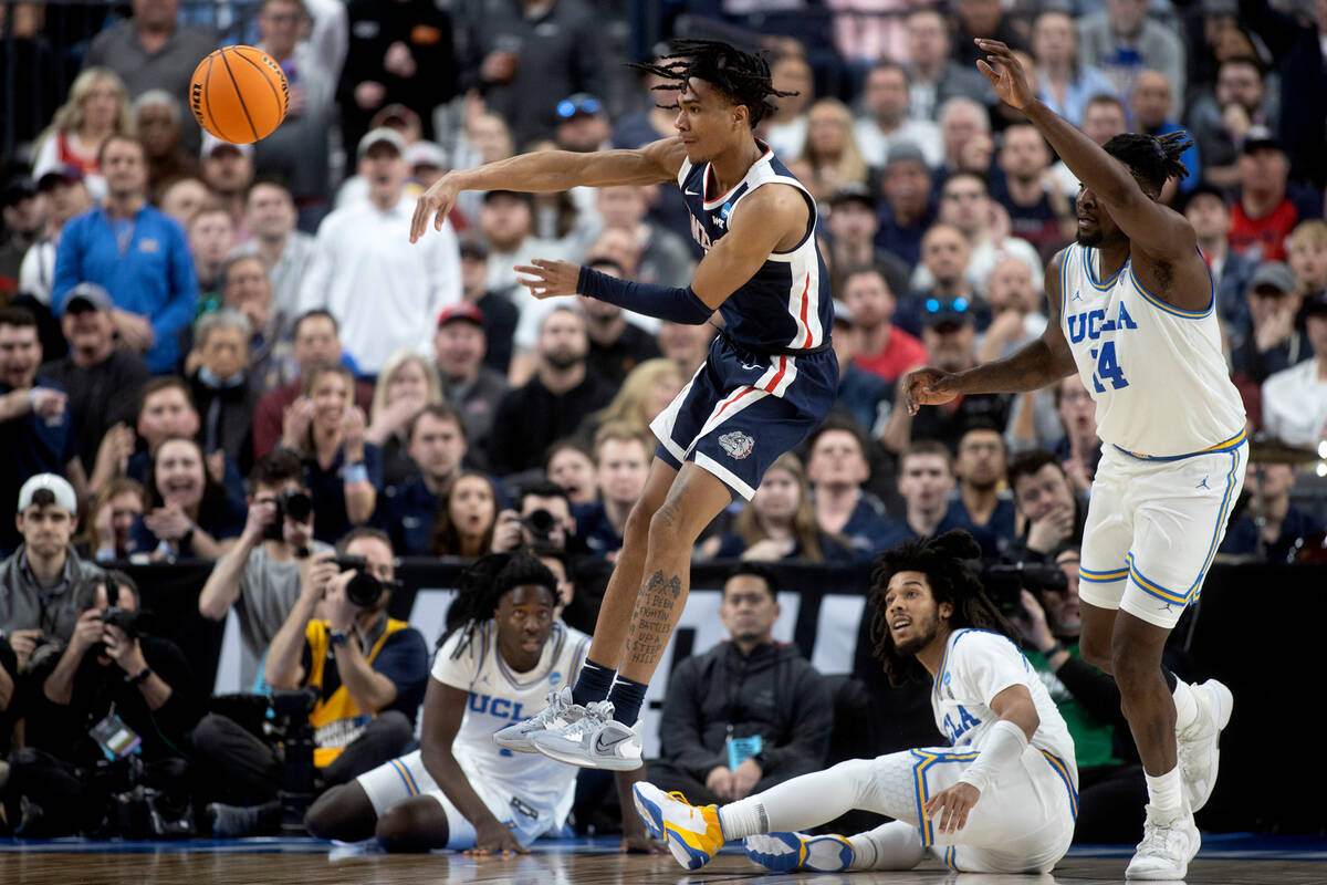 Gonzaga Bulldogs guard Hunter Sallis (5) jumps to pass after snagging possession from UCLA Brui ...