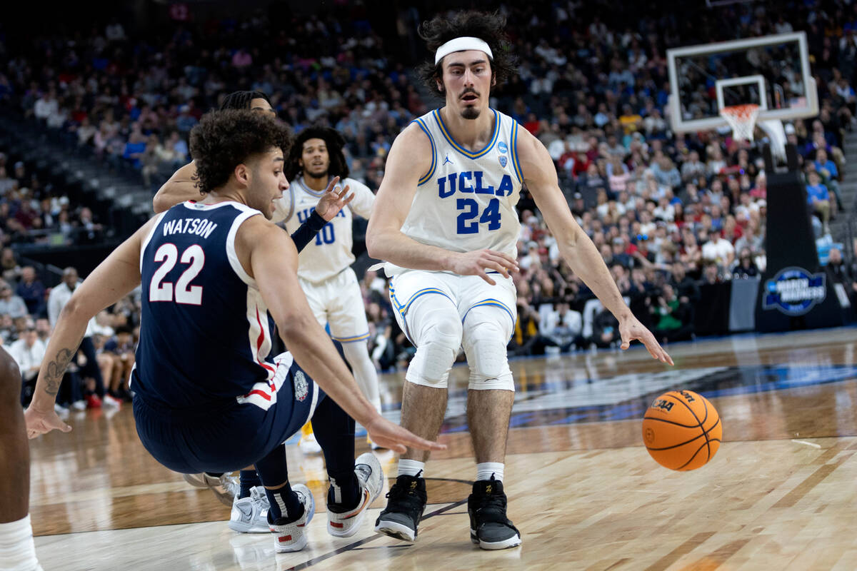 UCLA Bruins guard Jaime Jaquez Jr. (24) commits an offensive foul on Gonzaga Bulldogs forward A ...