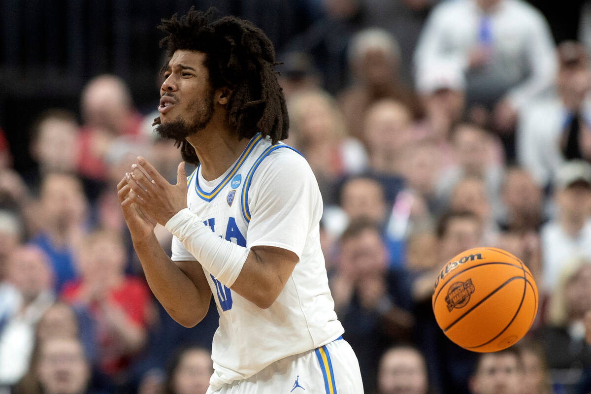 UCLA Bruins guard Tyger Campbell (10) reacts after a late foul is called on Bruins guard Jaime ...