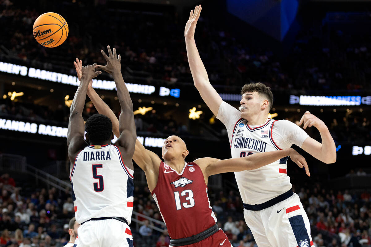 Connecticut Huskies guard Hassan Diarra (5) blocks a shot by Arkansas Razorbacks guard Jordan W ...