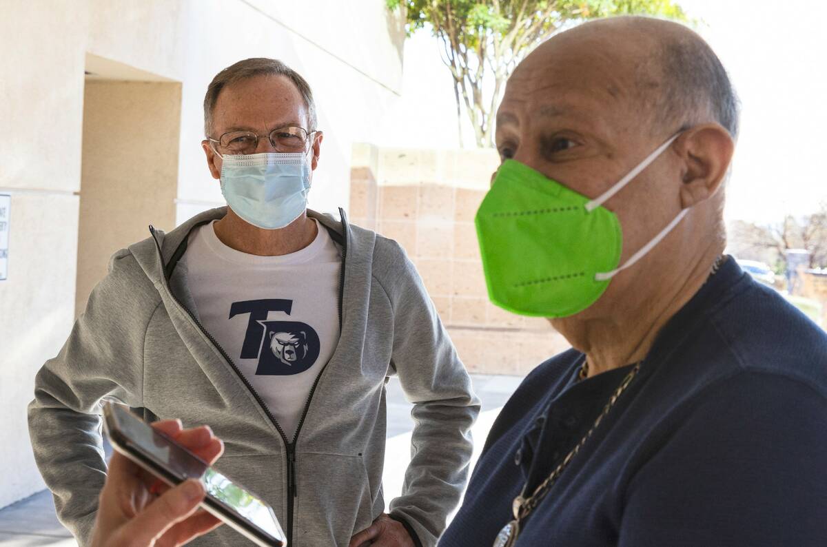 Lon Kruger, left, a former UNLV basketball coach, watches as his passenger, Jose A. Lee, a canc ...