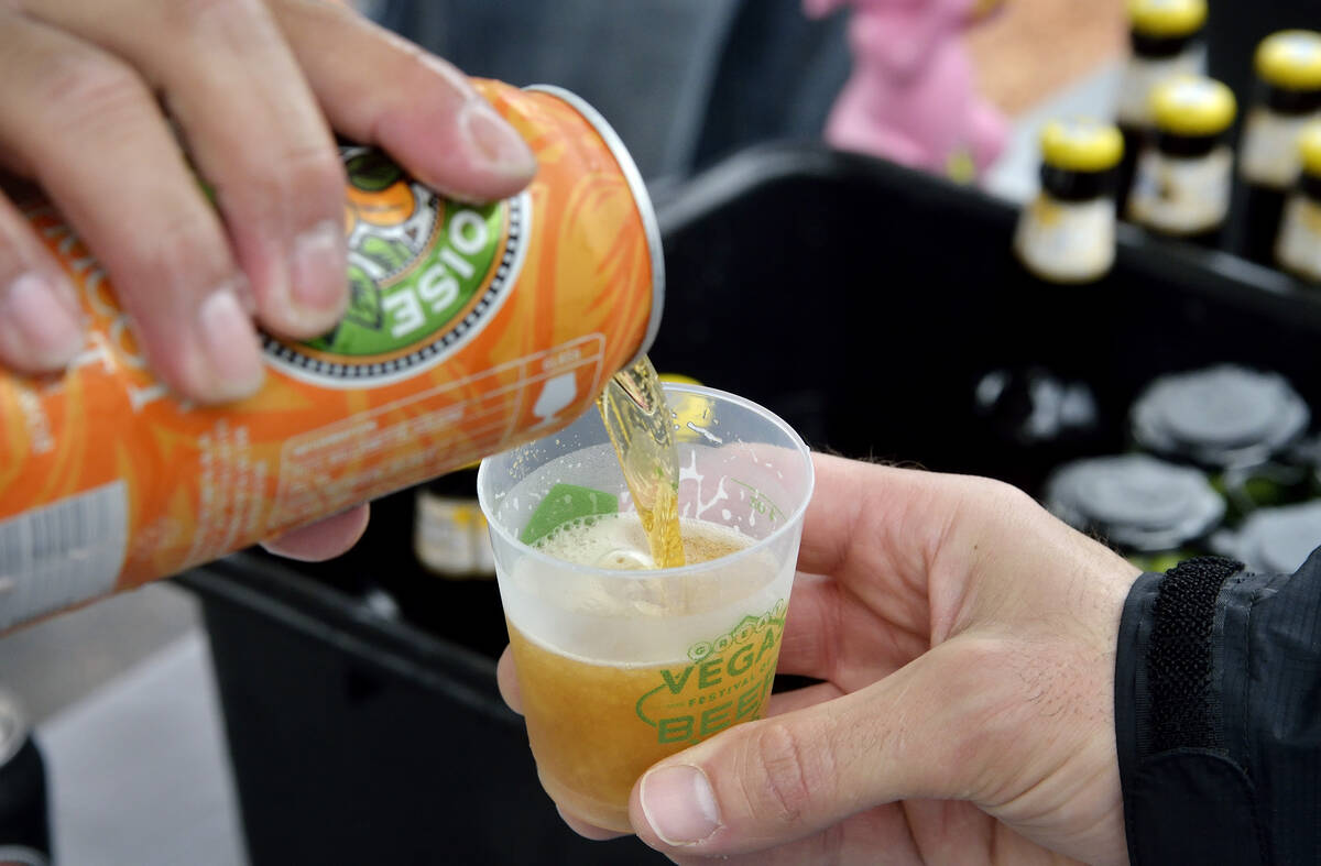 An apricot hefe is poured at the Eurobrews tent during the Great Vegas Festival of Beer in the ...