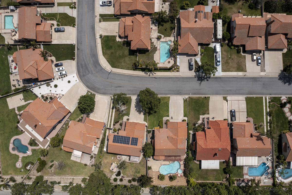 A drone image over a housing tract that has been part of the state water project, where outdoor ...