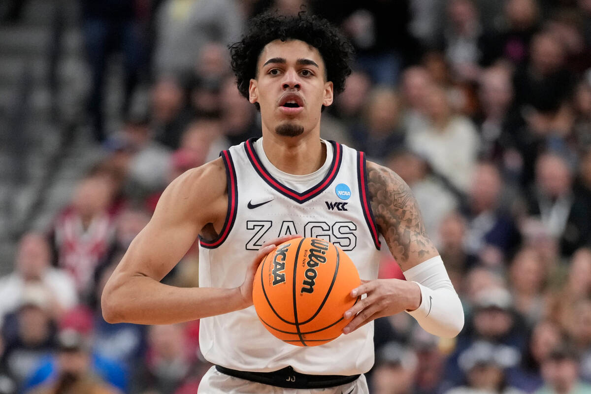 Gonzaga guard Julian Strawther handles the ball in the first half of an Elite 8 college basketb ...