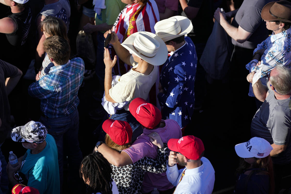 Supporters of former President Donald Trump listen as he speaks at a campaign rally at Waco Reg ...