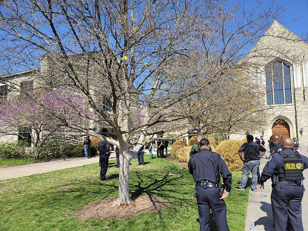 This photo provided by the Metro Nashville Police Department shows officers at an active shoote ...