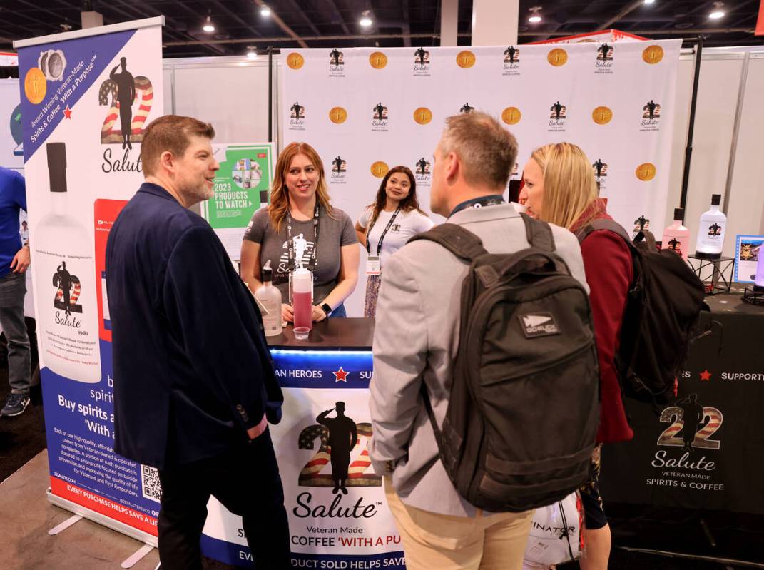 Co-founder and CEO Eric Ranks, from left, Maureen Ranks and Marelyn Salazar, with 22 Salute Spi ...