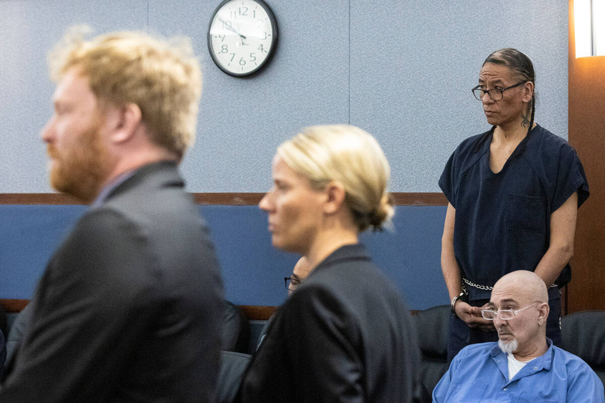 Former actor Nathan Chasing Horse, right, appears in court with his attorneys Tyler Gaston, lef ...