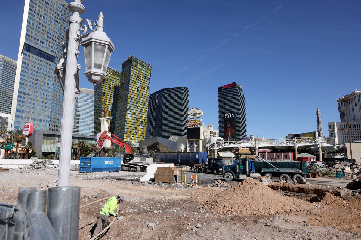 Crews clear the remains of buildings at 3755 Las Vegas Blvd. South on the Strip in Las Vegas Mo ...