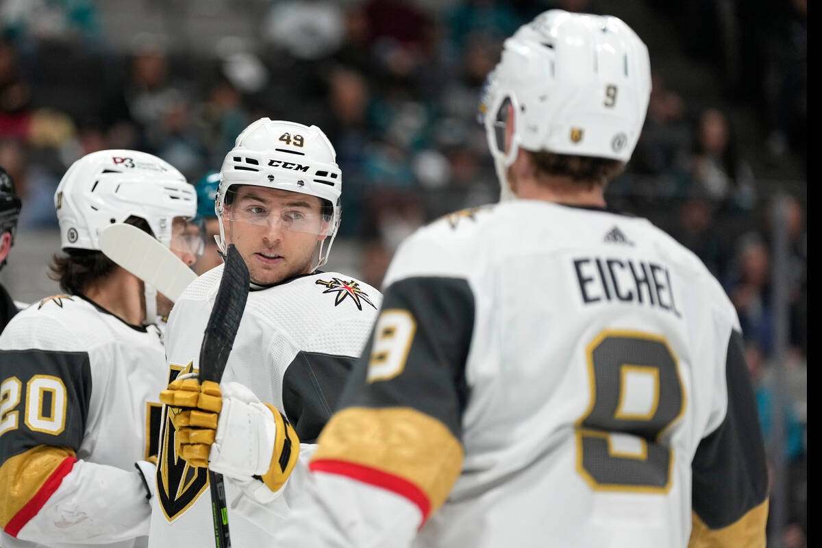 Vegas Golden Knights center Ivan Barbashev (49) is congratulated by Jack Eichel (9) after scori ...