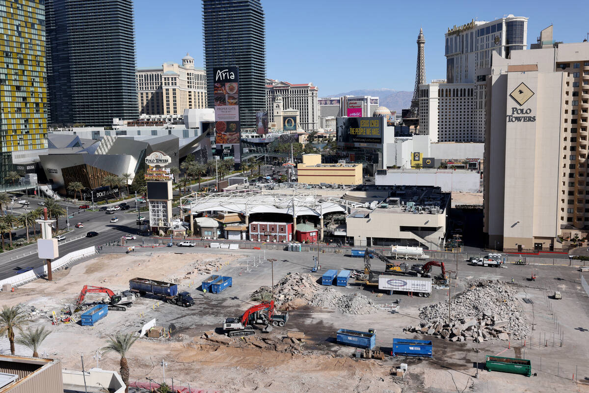 Crews clear the remains of buildings at 3755 Las Vegas Blvd. South on the Strip in Las Vegas Mo ...