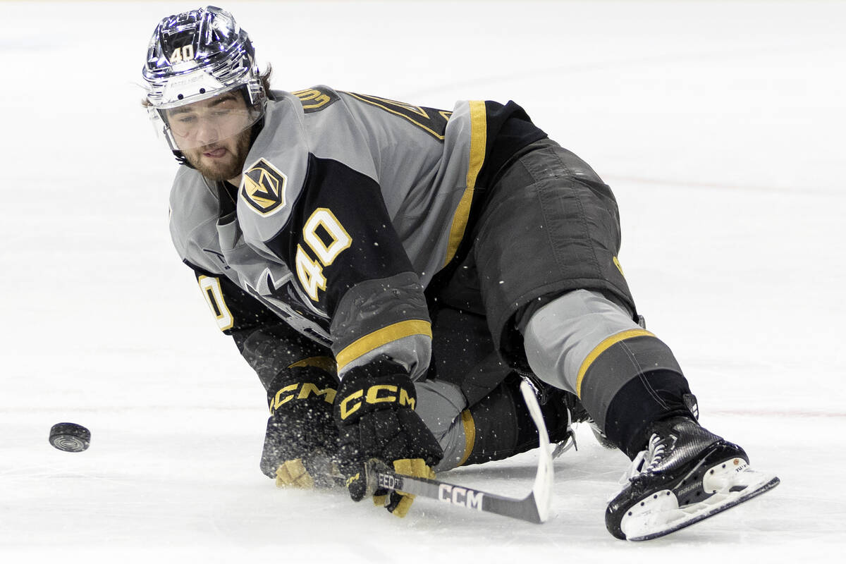 Henderson Silver Knights defenseman Lukas Cormier lunges to block a shot by the Tucson Roadrunn ...