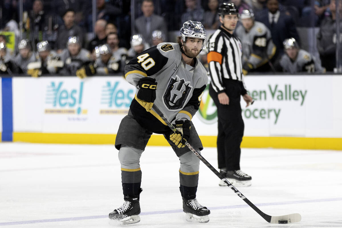 Henderson Silver Knights defenseman Lukas Cormier looks to pass during an AHL hockey game again ...