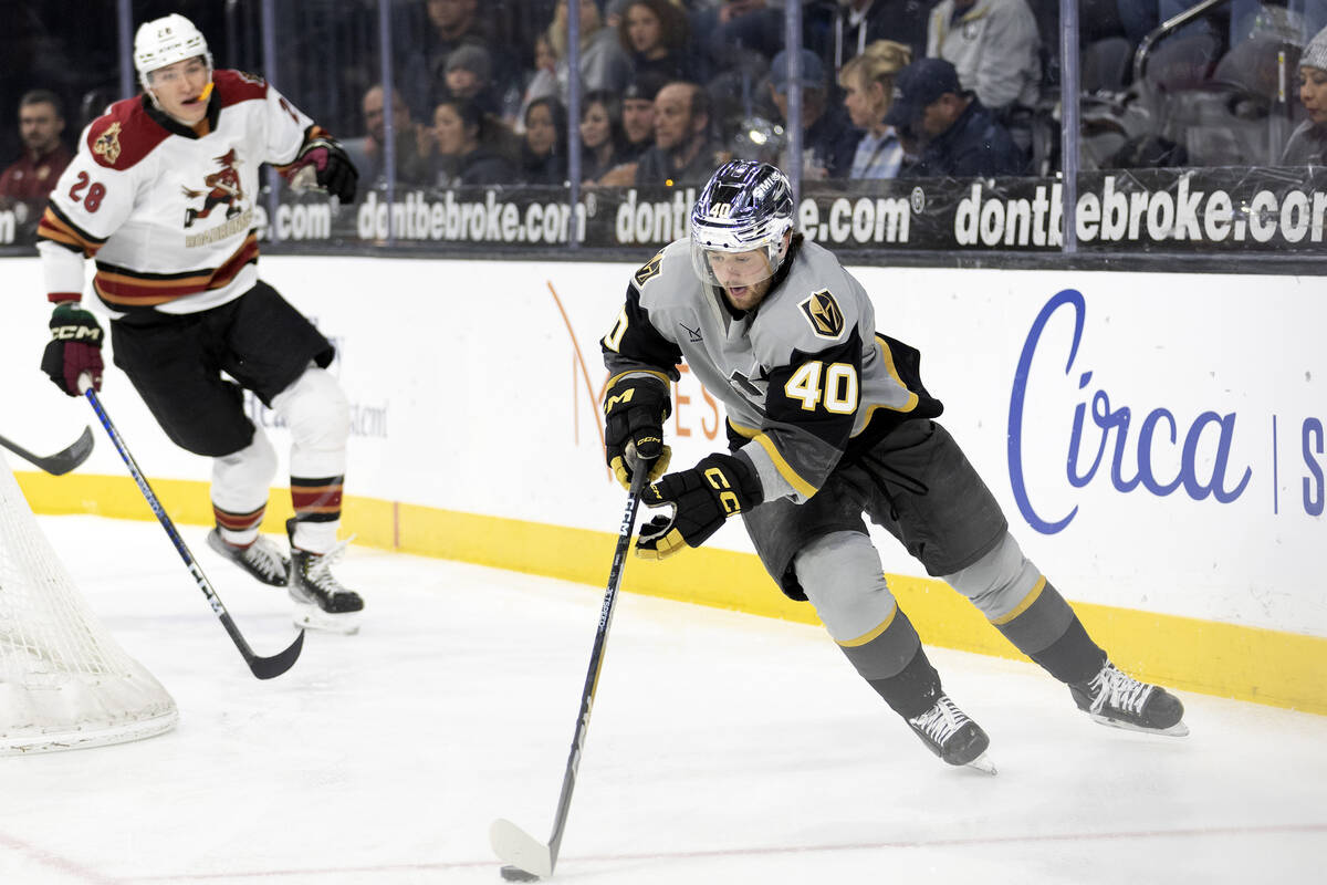 Henderson Silver Knights defenseman Lukas Cormier skates with the puck during an AHL hockey gam ...