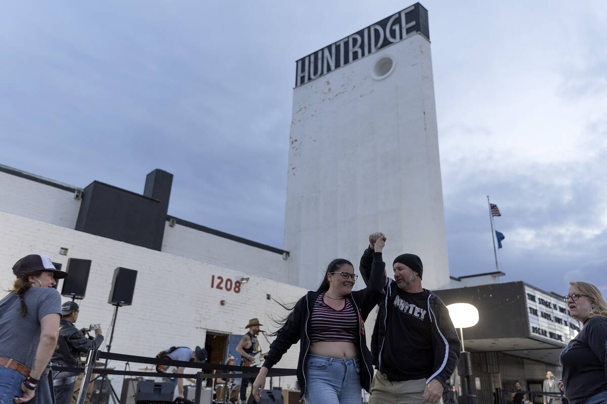 Bridget Nelson and Kevin Raschko dance to The Rhyolite Sound outside the Huntridge Theater duri ...