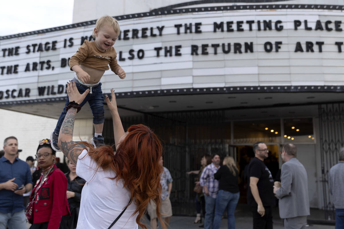 Ayreanna Metz plays with her son Oliver Metz, 2, at the Huntridge Theater during an event to re ...