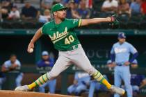 Oakland Athletics starting pitcher Chris Bassitt throws against the Texas Rangers during the fi ...