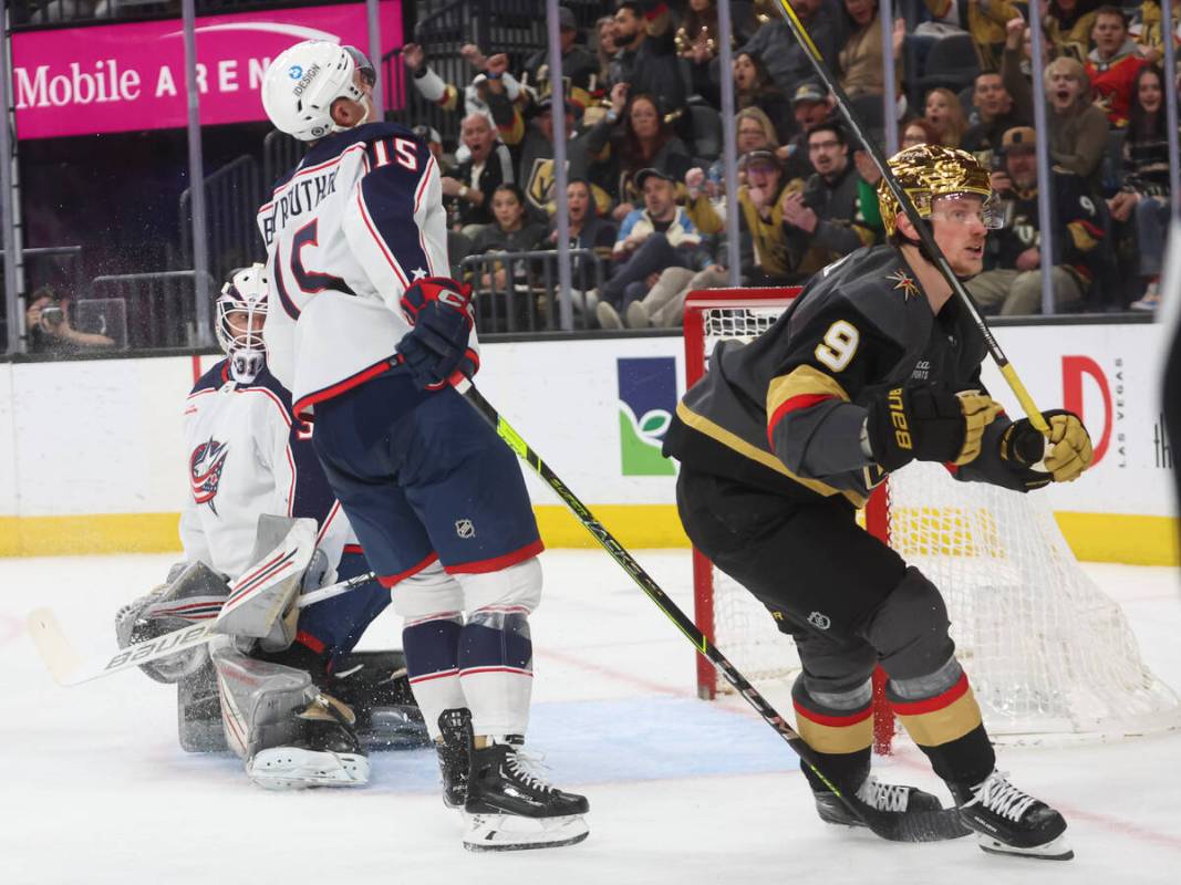 Golden Knights center Jack Eichel (9) reacts after scoring past Columbus Blue Jackets goaltende ...