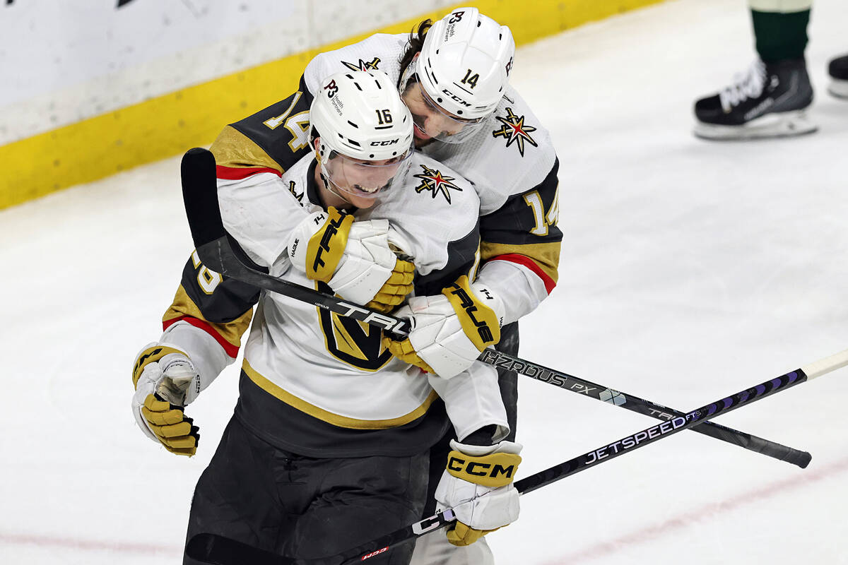 Vegas Golden Knights left wing Pavel Dorofeyev (16) celebrates with defenseman Nicolas Hague (1 ...