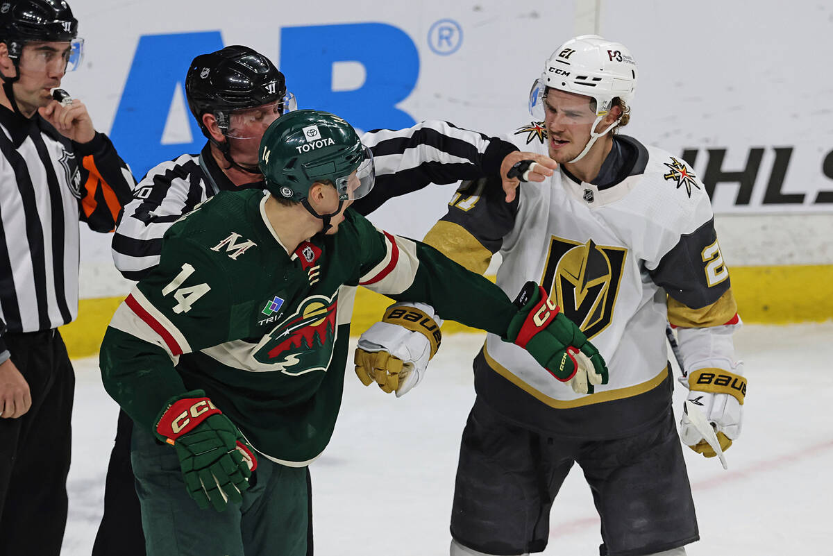 Minnesota Wild center Joel Eriksson Ek (14) argues with Vegas Golden Knights center Brett Howde ...