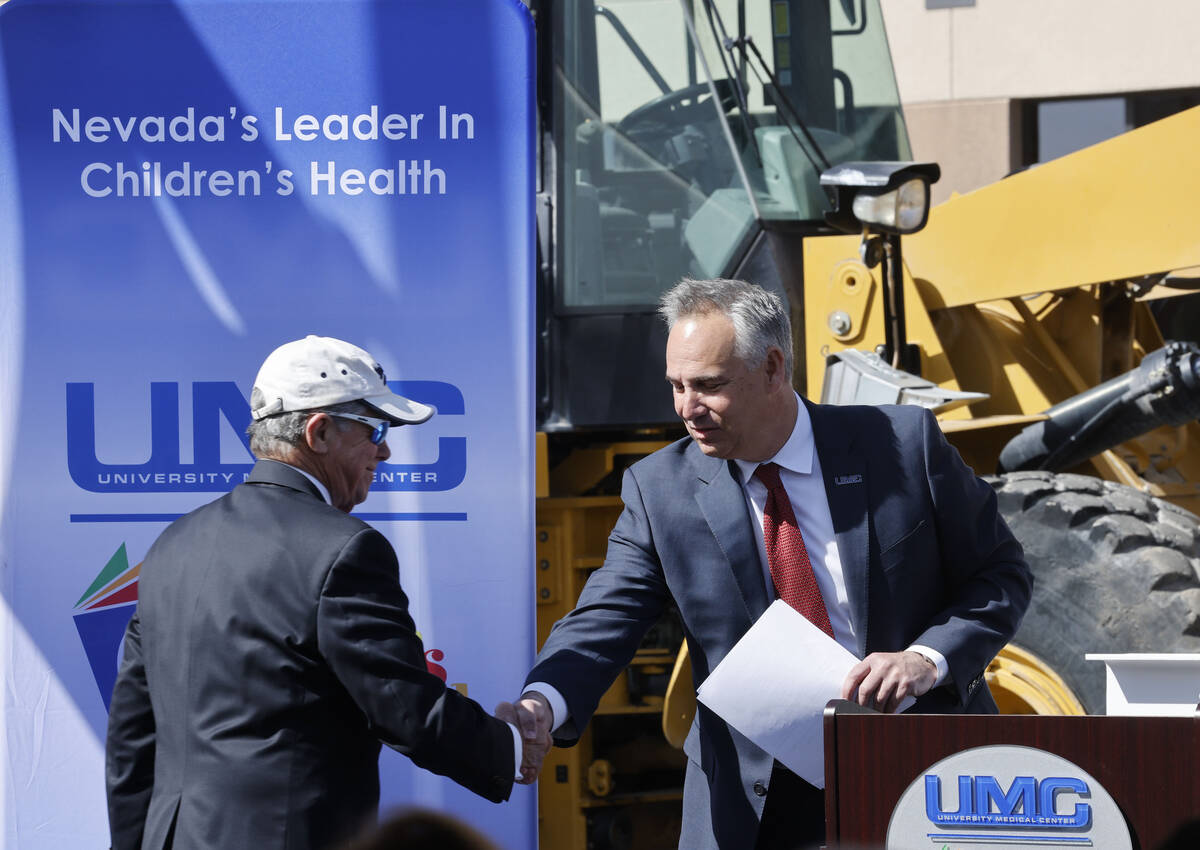 University Medical Center Governing Board Chairman John O' Reilly, left, and UMC CEO Mason Van ...