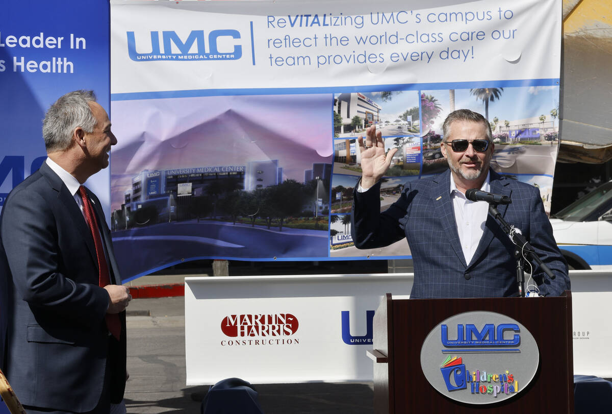 Guy Martin, president at Martin-Harris Construction, right, speaks as University Medical Center ...