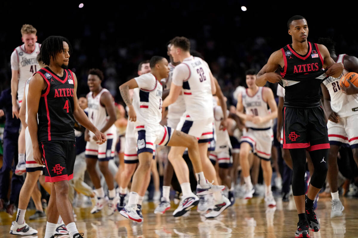 San Diego State guard Jared Barnett leaves the floor after their loss against Connecticut durin ...