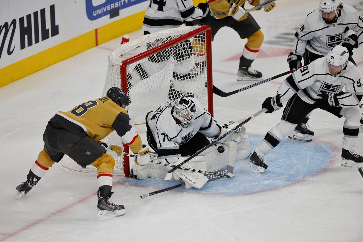 Golden Knights right wing Phil Kessel (8) pushes a puck to score during the first period of an ...