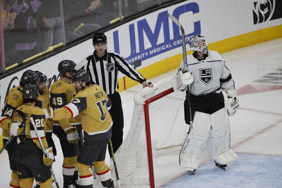 Golden Knights right wing Phil Kessel (8) celebrates with teammates after scoring against Los A ...