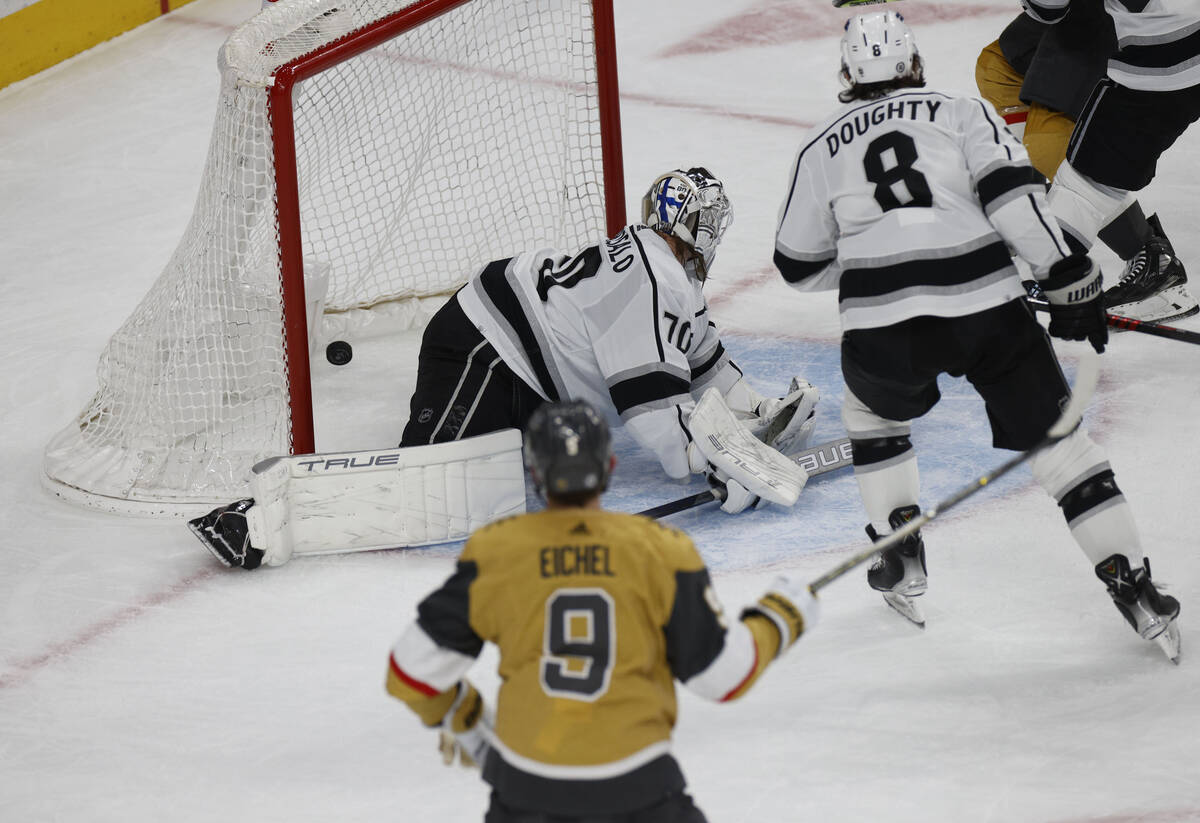 Los Angeles Kings goaltender Joonas Korpisalo (70) cannot stop a shot by Golden Knights center ...