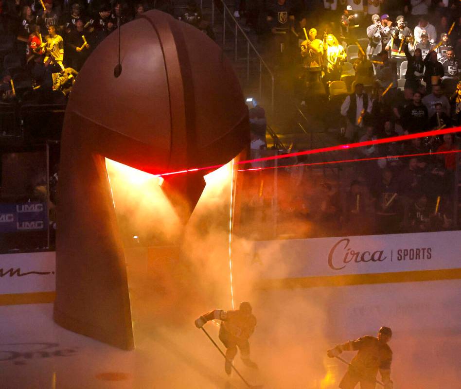 Golden Knights players come out during introductions before an NHL hockey game against Los Ange ...