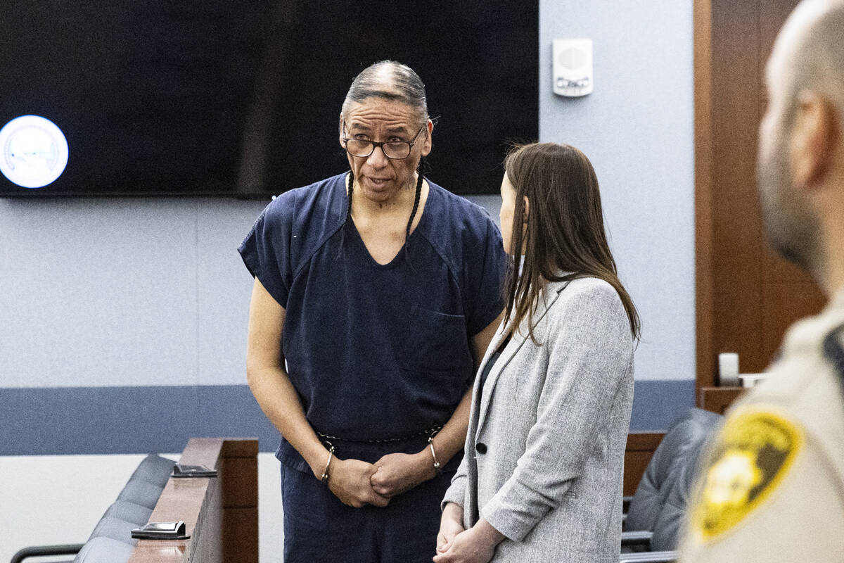 Former actor Nathan Chasing Horse, left, listens to his attorney Kristy Holston, a public defen ...