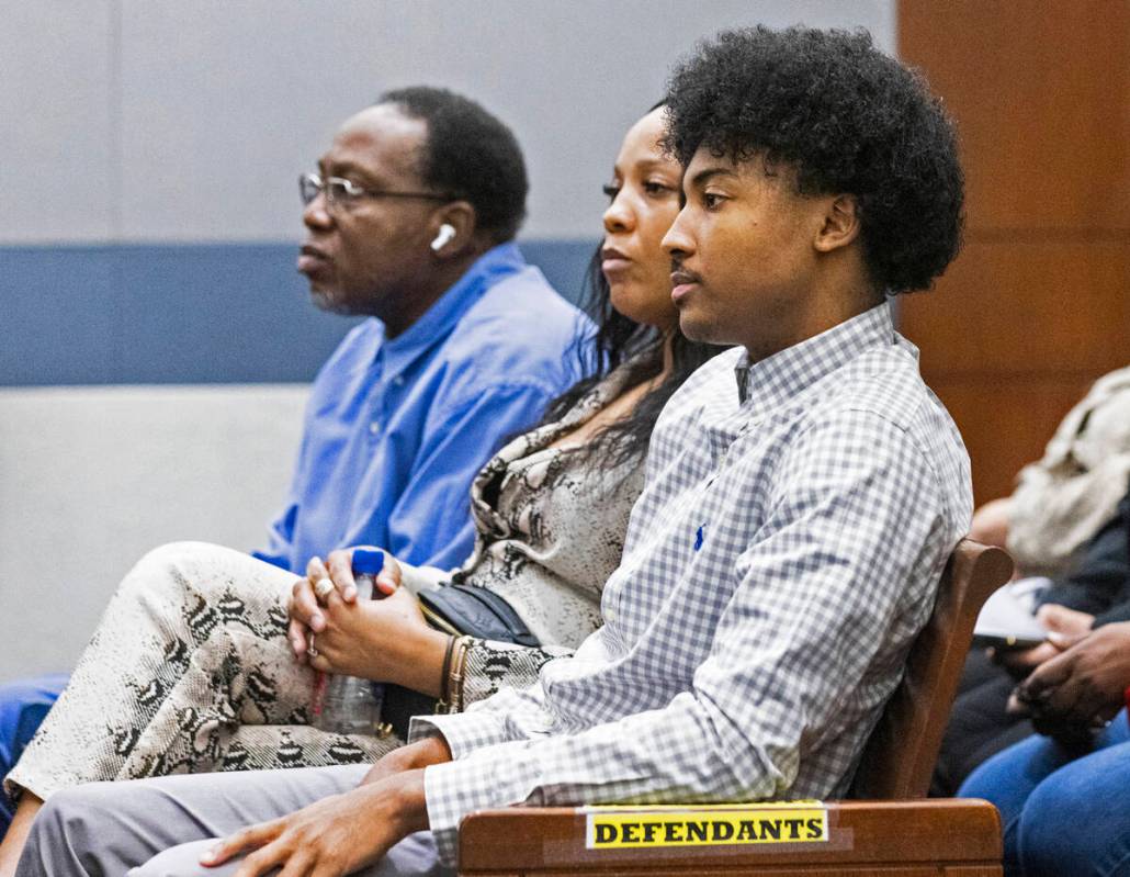 UNLV basketball recruit Zaon Collins, center, who is accused of causing a deadly crash two year ...