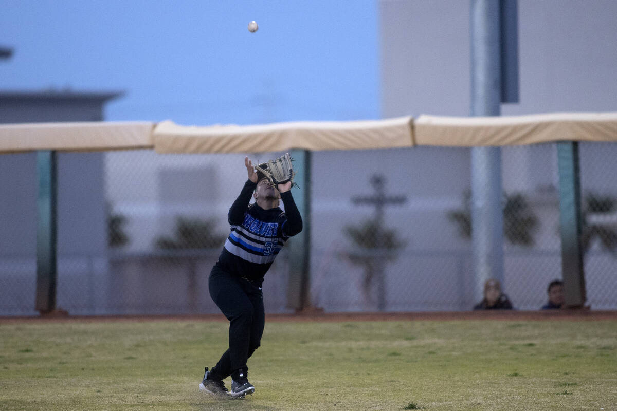 Basic outfielder Marcus Troyano prepares to catch for an out during a high school baseball cham ...